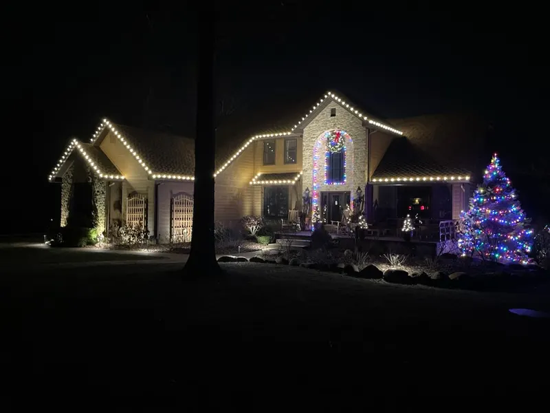 Residential Christmas light installation on a Fort Wayne area home