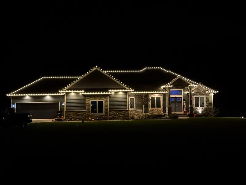 Christmas lights on a ranch home roofline
